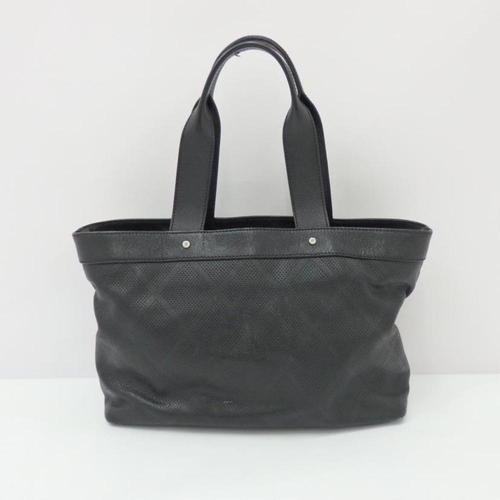 Chanel Black Bag Punching Tote